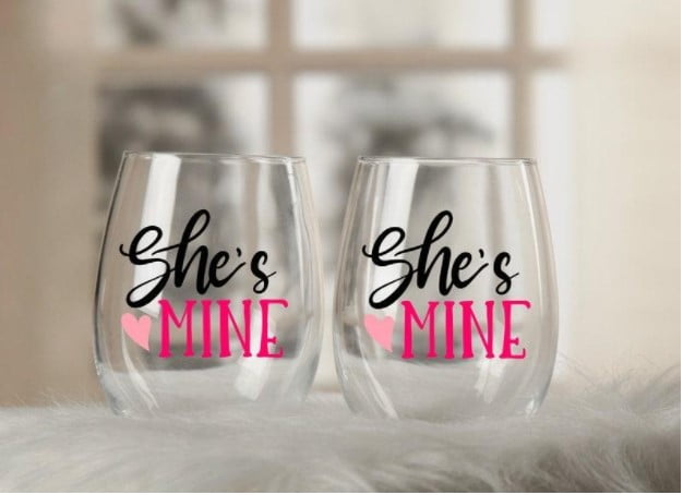 A stemless wine glass set with a print She’s mine as a lesbian Valentine’s Day gift